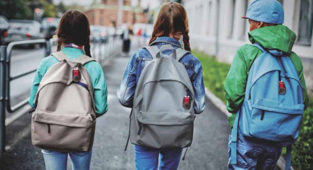 Как правильно носить школьный рюкзак